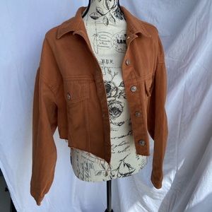 Orange cropped jean jacket